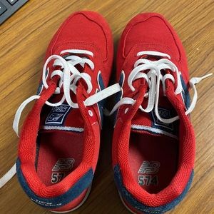 574 New Balance. Size 6.5 youth but fits. Size 8 womens.